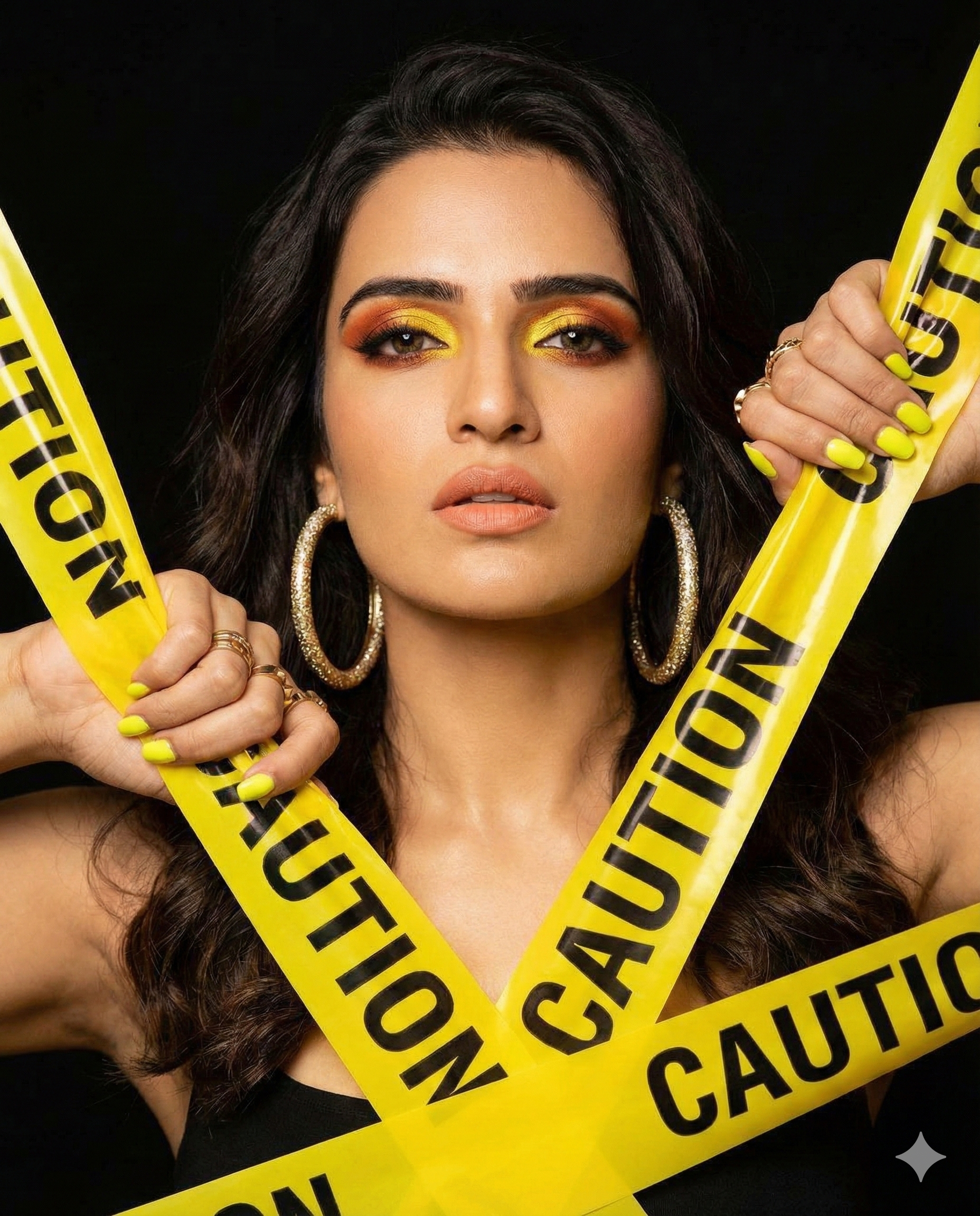 Create an image without changing my face or hair, don't change anything about my features. The image is a close-up portrait of a woman with a bold and vibrant look, framed by multiple strips of bright yellow and black warning tape. Model Details • Skin and Hair: The woman has a dark, warm skin tone. Her hair is straight, deep black, falling around her face and shoulders. • Makeup: Her makeup is striking and focuses on warm and yellow tones, matching the warning tape: • Eyes: She wears bright yellow and burnt orange eyeshadow with a metallic finish and winged eyeliner. Her eyebrows are dark, well-defined, and arched. • Lips: Her lips are a peachy nude or light brown with a matte finish. • Nails: Her nails are long, almond-shaped, or square, and painted a neon yellow or bright yellow that harmonizes with the tape. • ​Accessories: She wears shiny, gold jewelry: • ​Earrings: Large circular hoops encrusted with glitter or diamonds. • ​Rings: Several rings on her fingers, including a large one on her ring finger and another on her pinky. ​Composition and Setting • ​Background: The background behind the woman is completely black, which helps her and the bright yellow tape stand out dramatically. • ​The Warning Tape: The woman is surrounded and partially obscured by several strips of bright yellow "CAUTION" tape with black capital letters. She is grasping and manipulating the tape strips with her hands, poking her face through them, creating a dynamic framing effect and a sense of controlled danger or warning. • ​Posing: The woman looks directly into the camera with an intense and confident expression. Her hands are raised, holding the tapes on either side of her face. In short, it's a high-contrast beauty and fashion photograph with a color palette dominated by yellow, black, and warm skin tones, conveying a sense of boldness and attention.